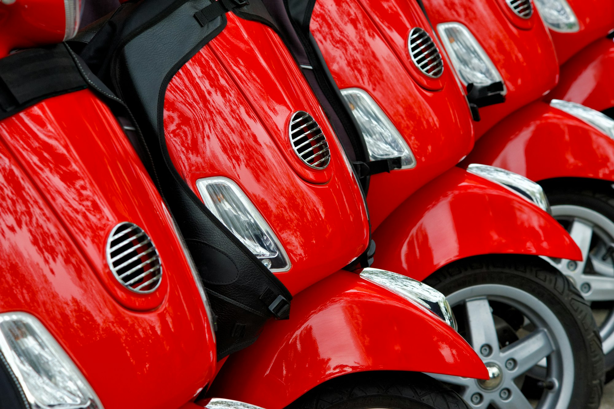 Group of red scooters